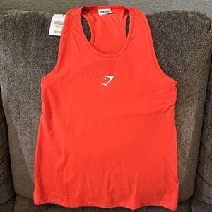 Gymshark orange  Sleeveless Top
Never worn new